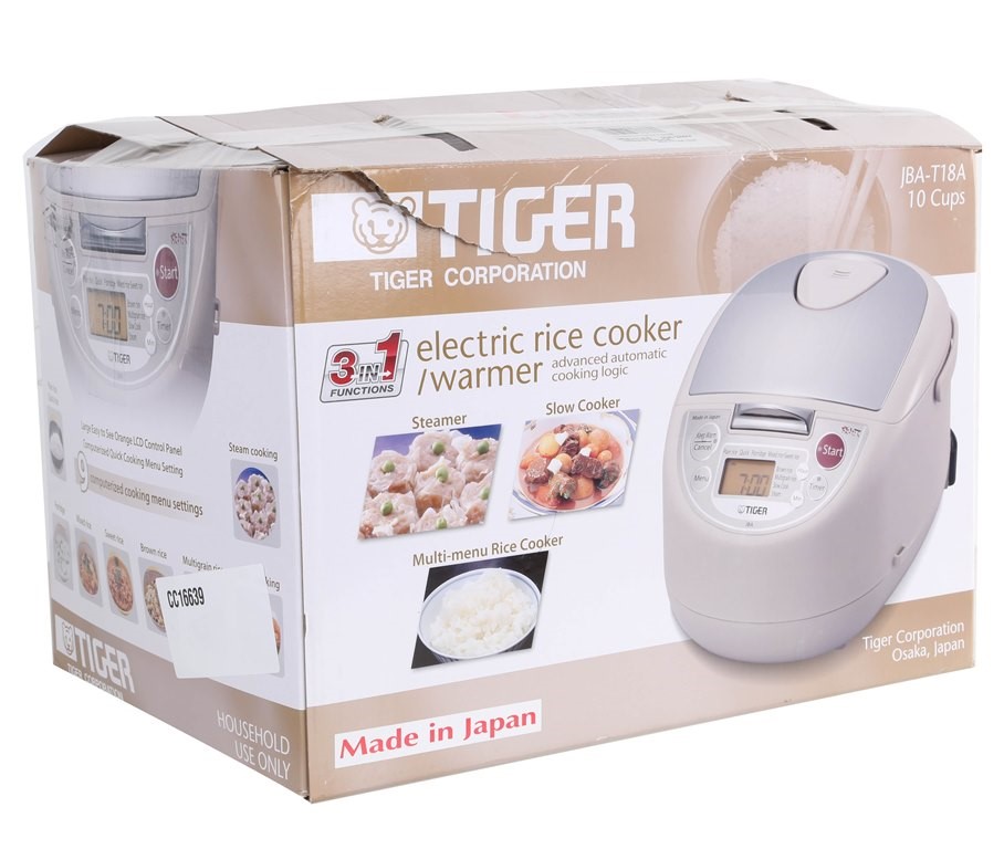 TIGER Electric Rice Cooker/ Warmer, Model JBAT18A. N.B. Condition unknown. Auction