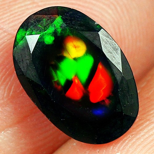1.3ct Natural Oval Facet Ethiopian Black Play Of Colour Opal