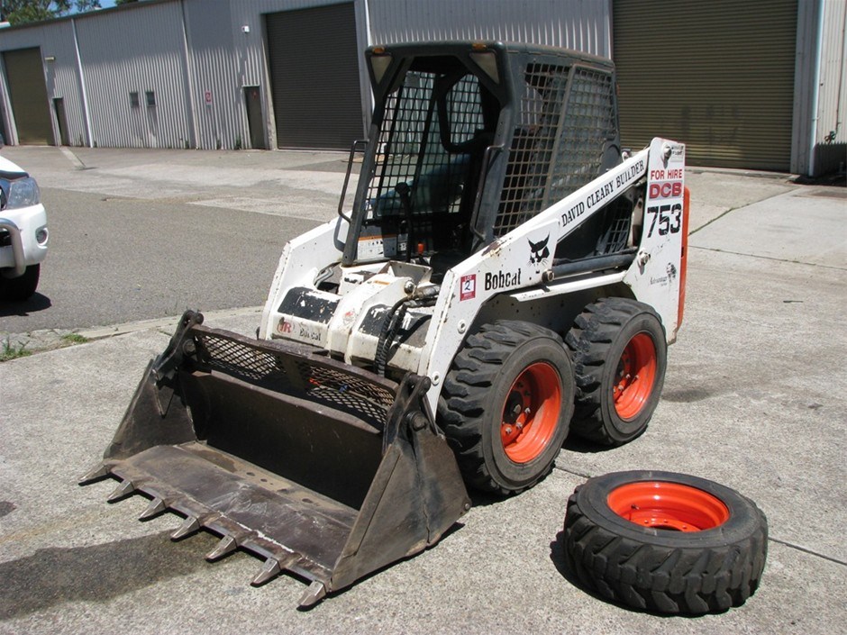 Bobcat, model 753, G series, VIN 515833877, fitted with 4 in 1 bucket