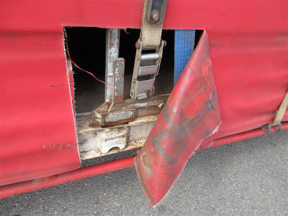 Rash Vest Made With Water Reactive Fabric Showing Dolphin Print When Wet