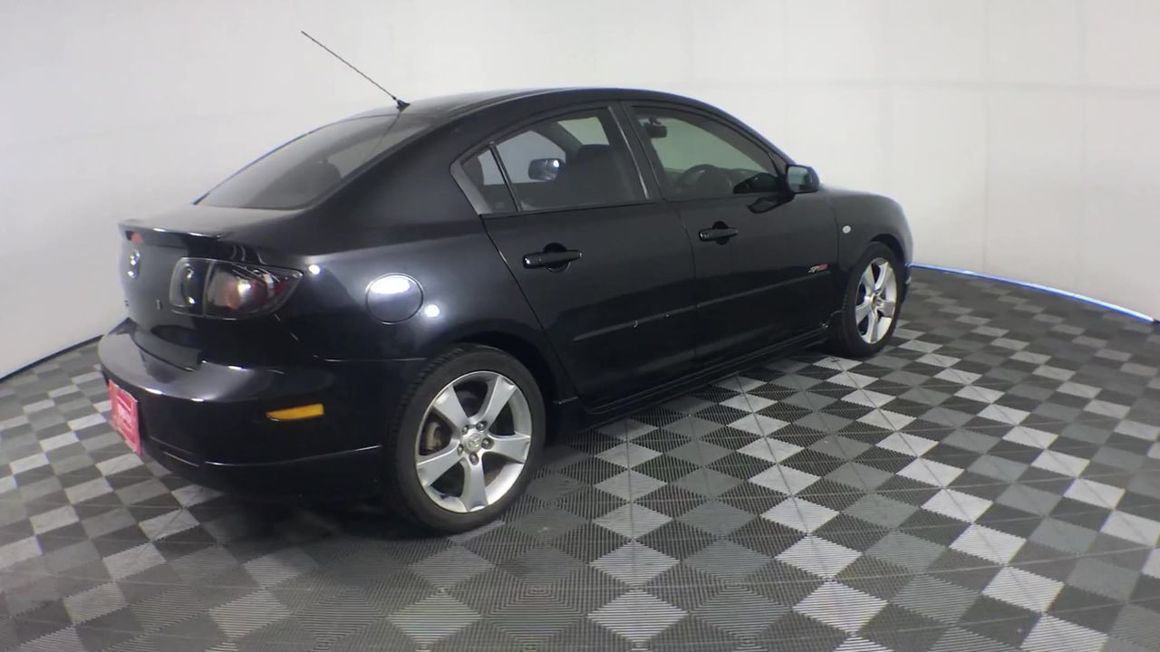 Designer Simulated Diamond Round Black Drop Earrings in Gold