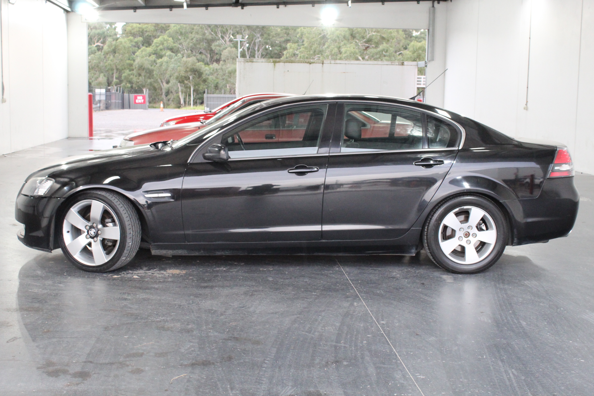 Designer Simulated Diamond Ball Bracelet with Braided Brown Band