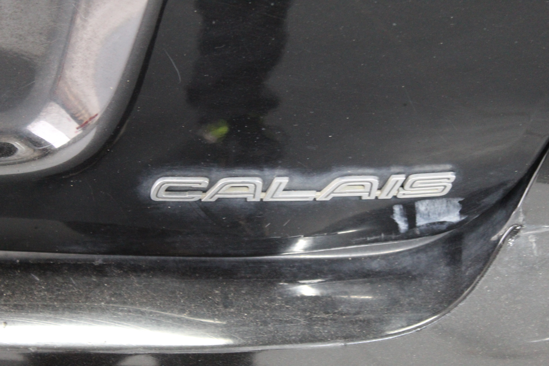 Designer Simulated Diamond Round Black Drop Earrings in Gold