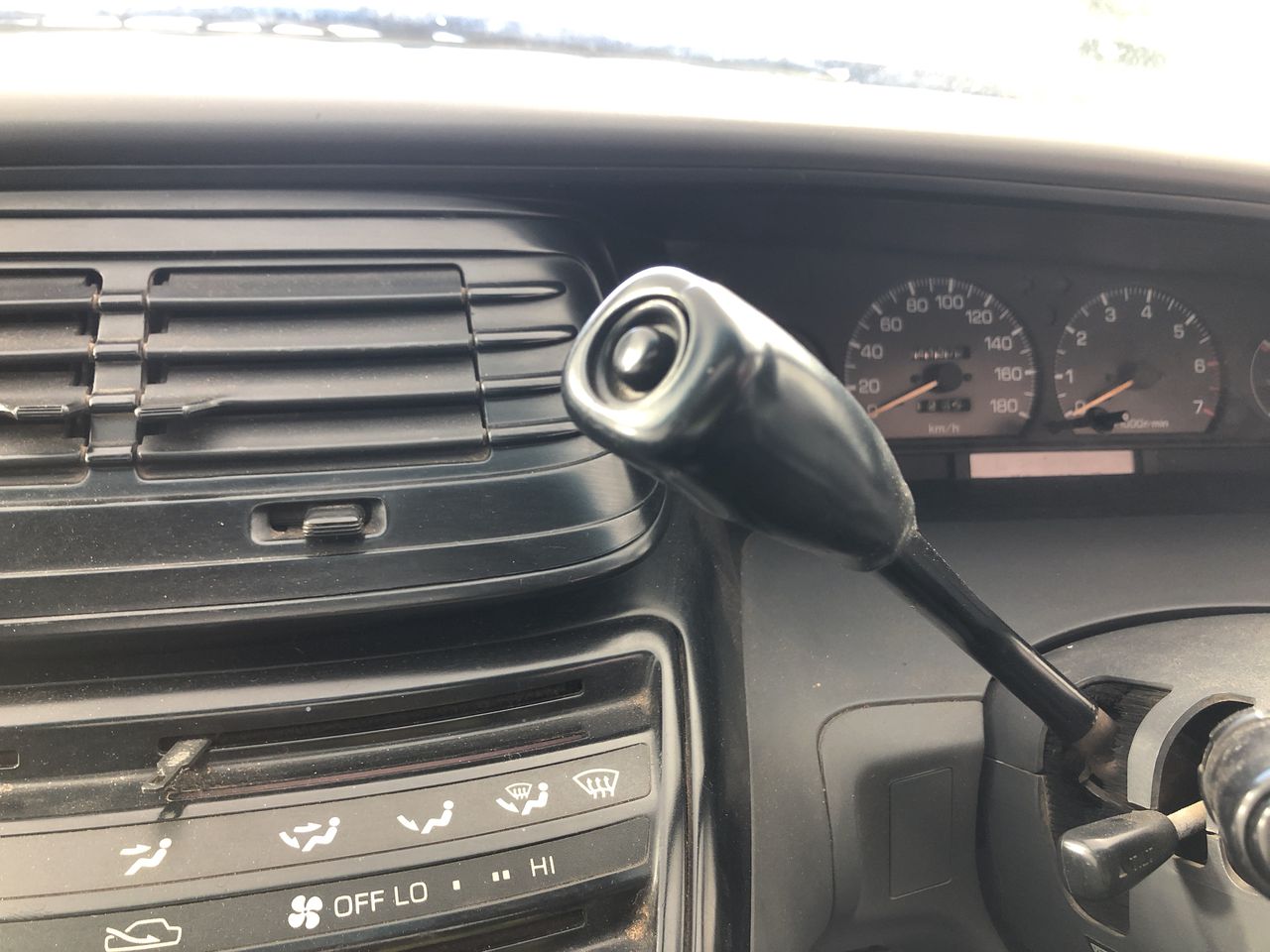 10 carat red ruby rough in glass vial
