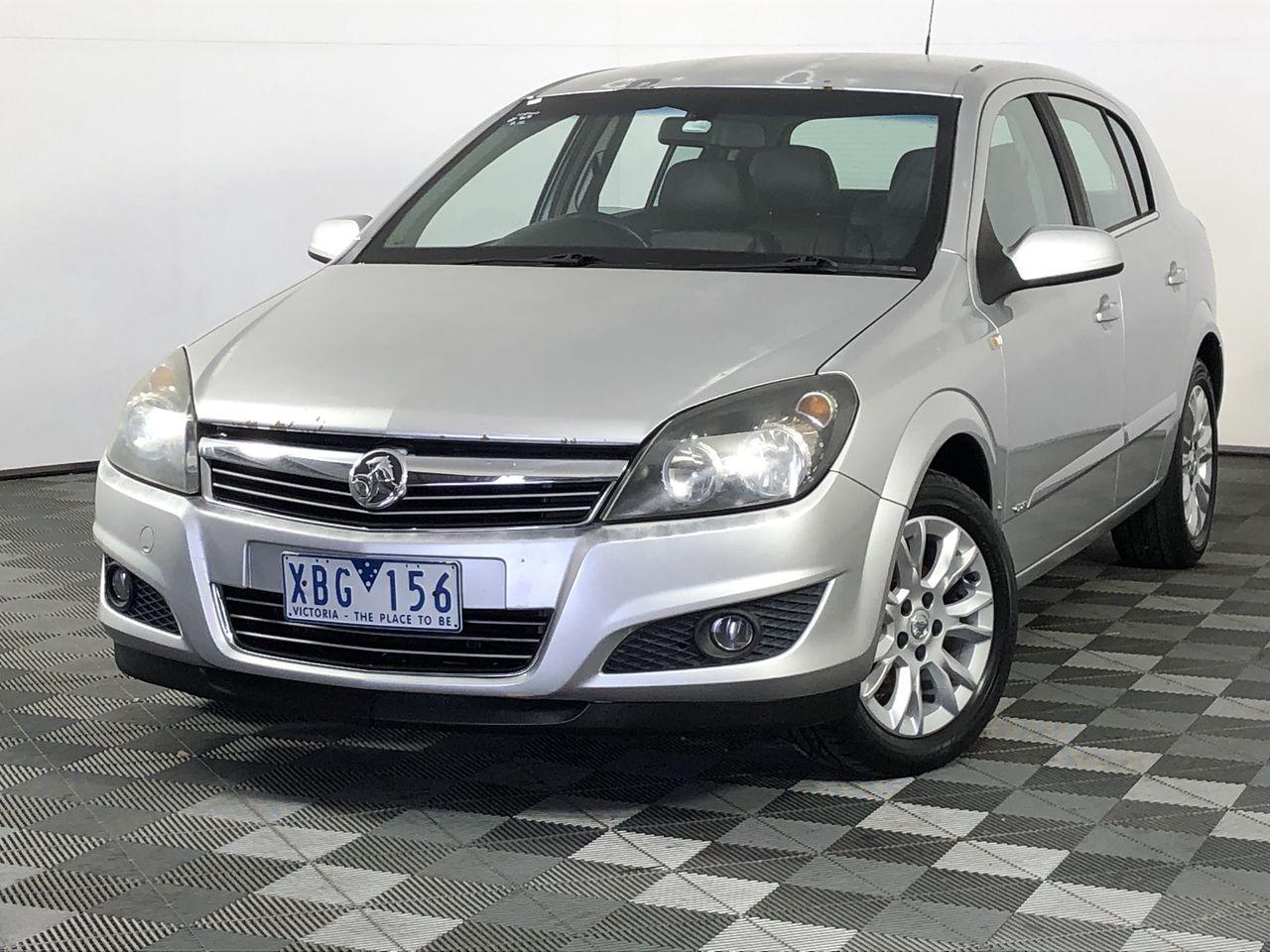 BIJ'OR - Genuine Black Freshwater Pearl and Simulated Diamond Leaf Stud