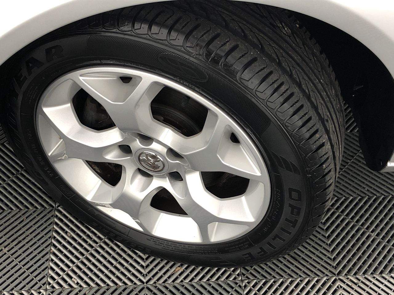 Designer Simulated Diamond Green Square Teardrop Earrings in Silver