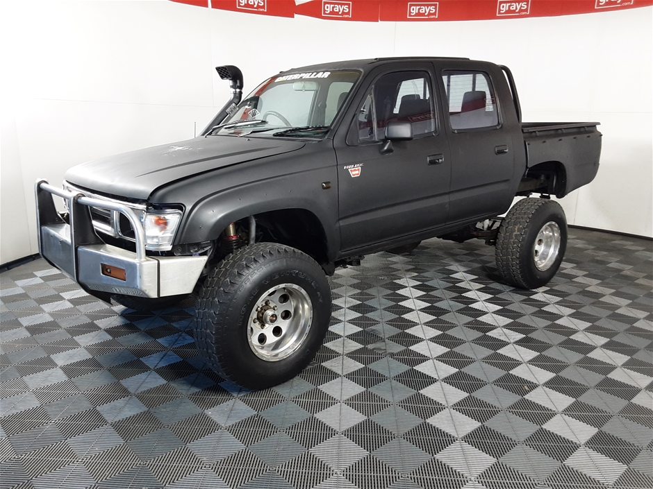 1999 maroon toyota hilux 4x4 pickup