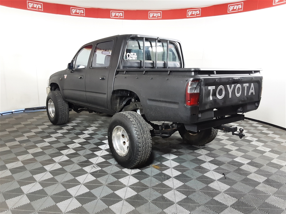 1999 maroon toyota hilux 4x4 pickup