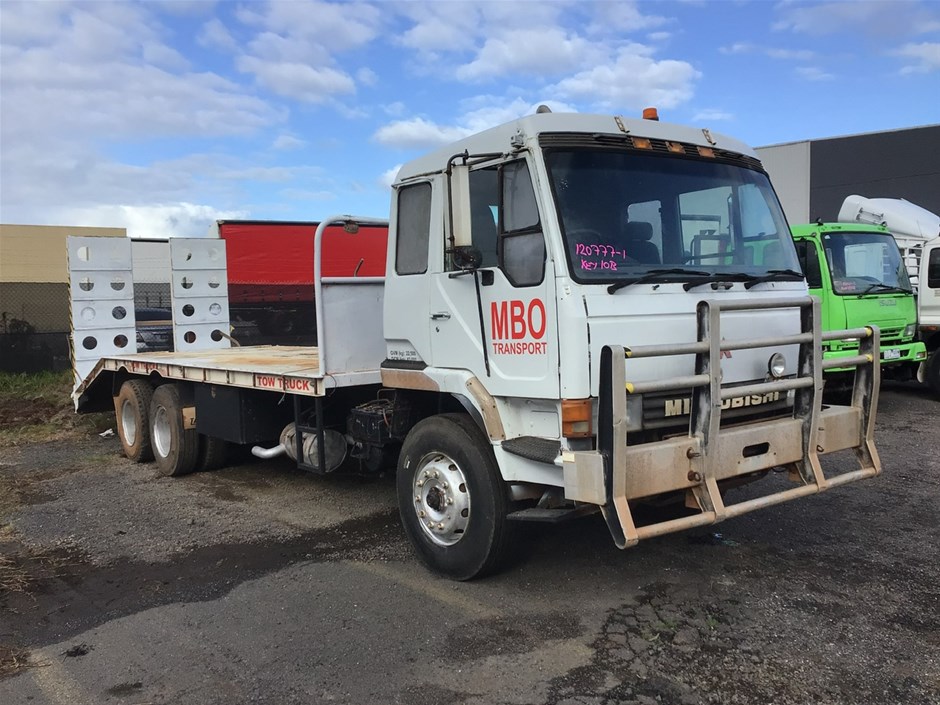 Unreserved 1985 Mitsubishi (6 x 4) Beavertail Truck