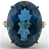 9CT YELLOW GOLD, 0.06CT DIAMOND & 11.65CT BLUE TOPAZ RING