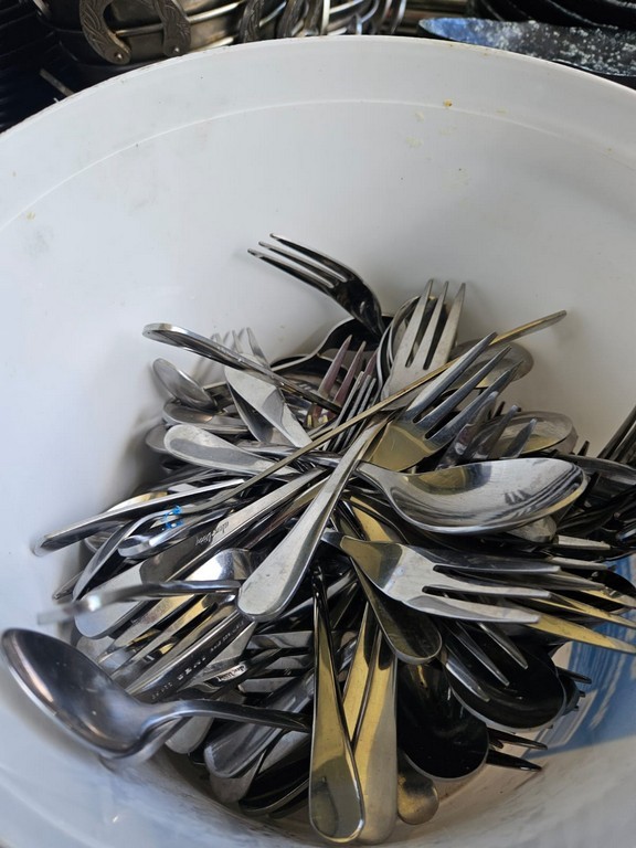 Bucket of Assorted Dessert Forks and Spoons