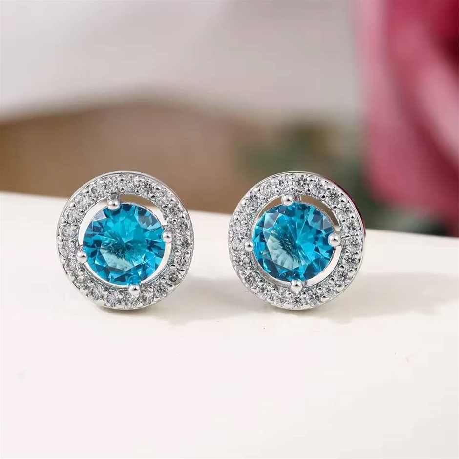Designer Simulated Diamond Sky Blue Round Stud Earrings in Silver