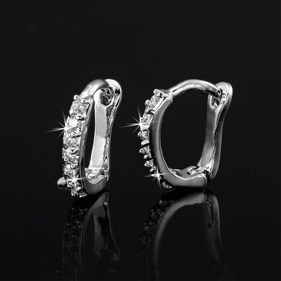 Solid 925 Sterling Silver Huggie Earrings Featuring Crystals by Swarovski®