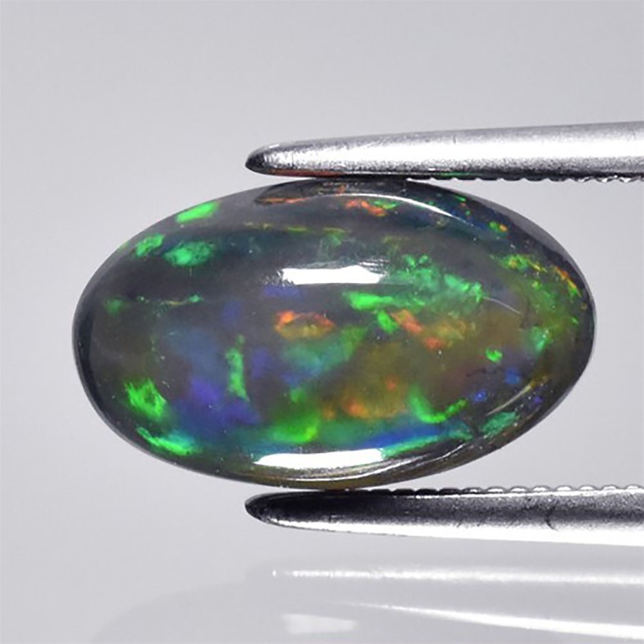 1.40ct Oval Cabochon Cut Play-of-Color Black Opal Gemstone - 1Pc