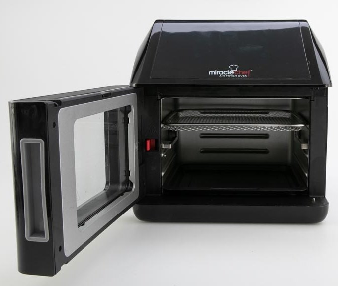 MIRACLE CHEF 7 in 1 Multi Cooker TXG-DT10L, Black. NB: Used, no box