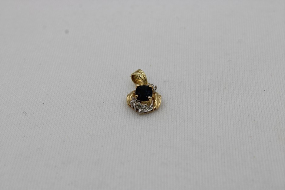 1 x Stamped 14k Yellow Gold, 1 Blue Sapphire Set Pendant