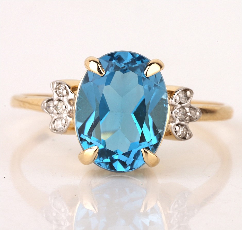 Yellow Gold Natural Swiss Blue Topaz & Diamond Ring  with Valuation