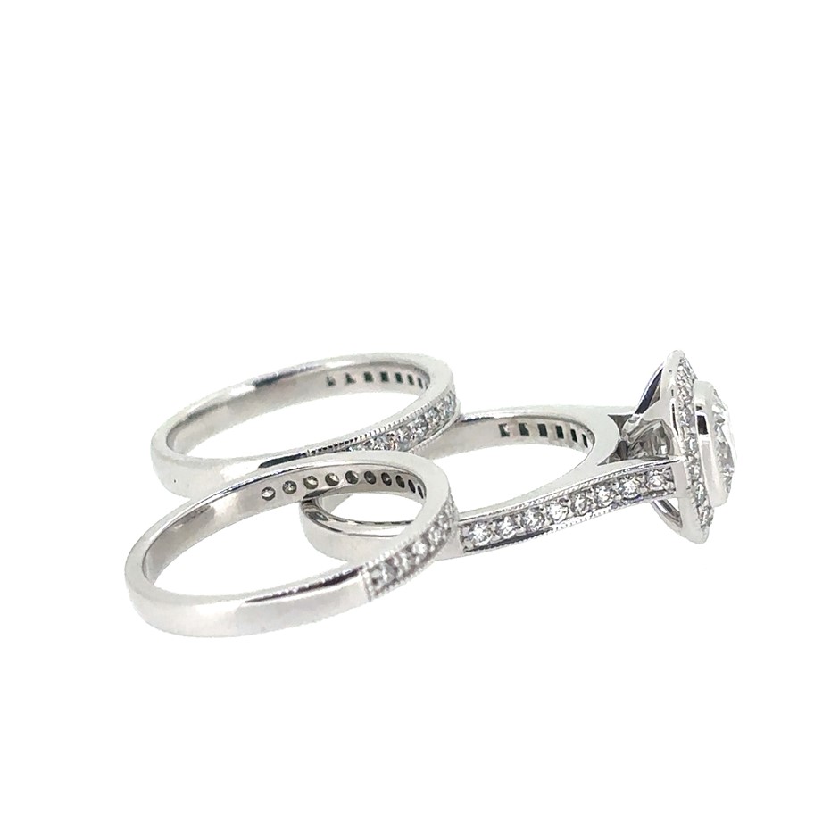 0.92ct a cushion Dia. E/SI1 With GIA Cert. & 0.45ct 34 round Stones Dia.