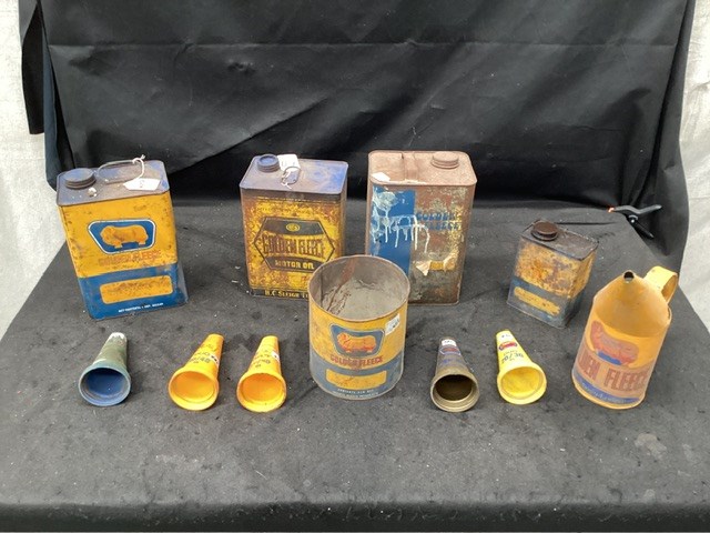 Collection Of Assorted Golden Fleece Oil Cans And Funnels