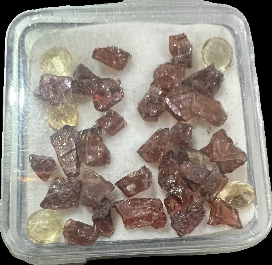 16.50 carat citrine round & ruby rough gemstone