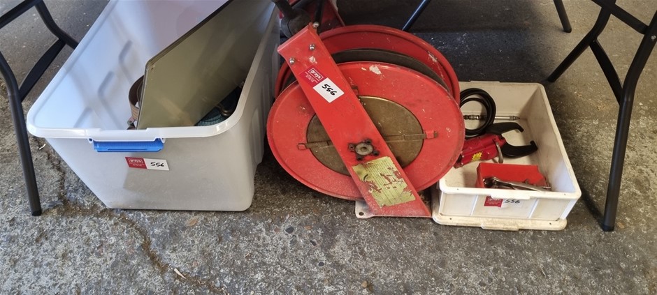 Fire hose and 2 bins various items