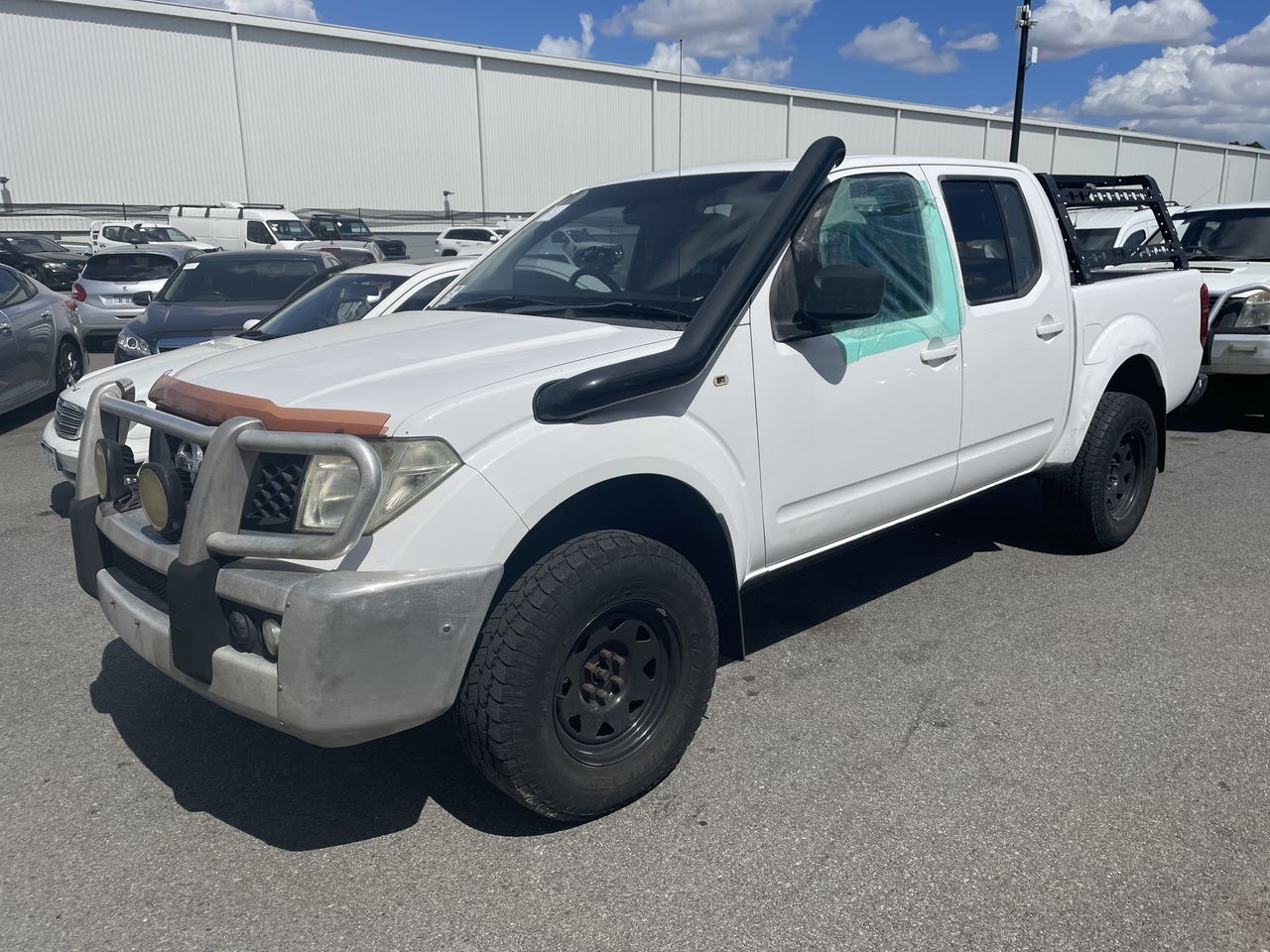 2010 Nissan Navara RX (4X4) D40 Turbo Diesel Manual Dual Cab