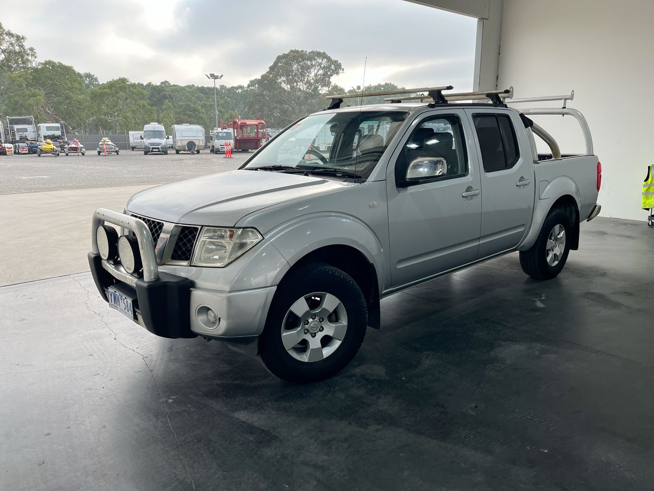 2009 Nissan Navara ST (4x4) D40 Turbo Diesel Manual Dual Cab