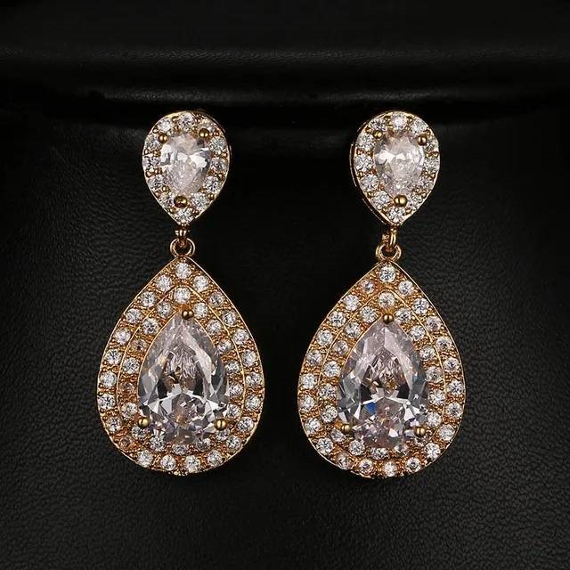 Designer Simulated Diamond Teardrop Earrings in Gold