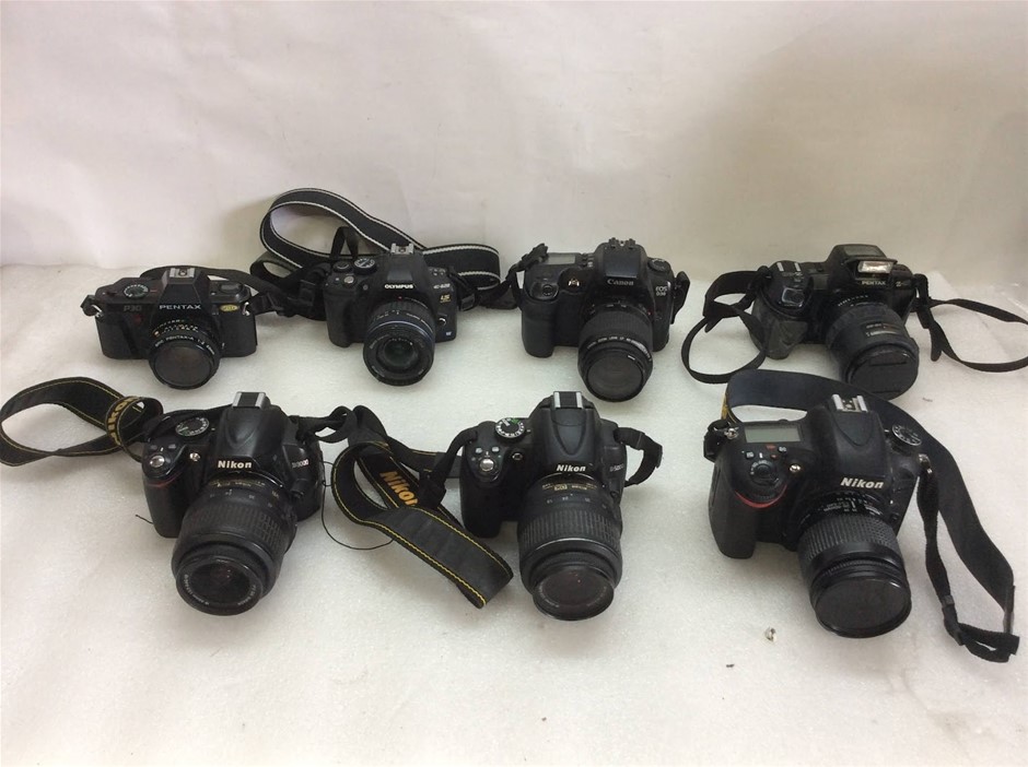 Mixed DSLR Cameras Including Nikon, Canon, Olympus And Pentax (Lot of 7)