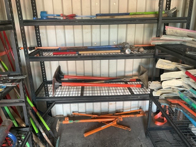 Assorted Sledge Hammers, Handheld Compactors and Picks