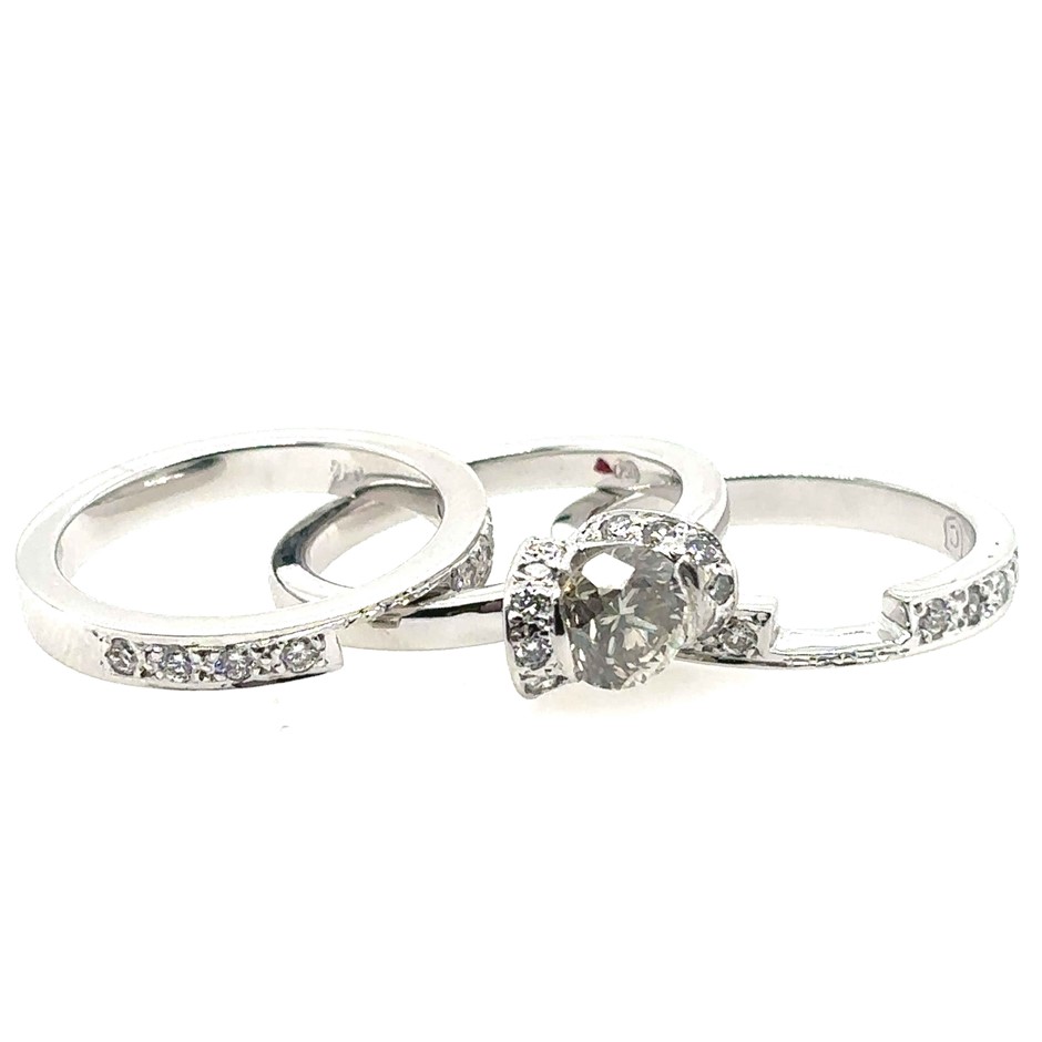 1.00ct Round Dia. P2/W-X Light brownish yellow & 0.50ct 30 Stones Round Dia