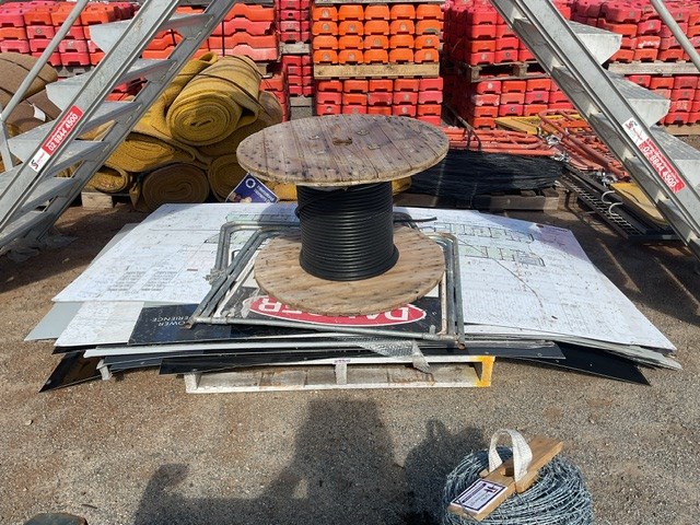 Pallet Of Signs and Part Roll Of Cable