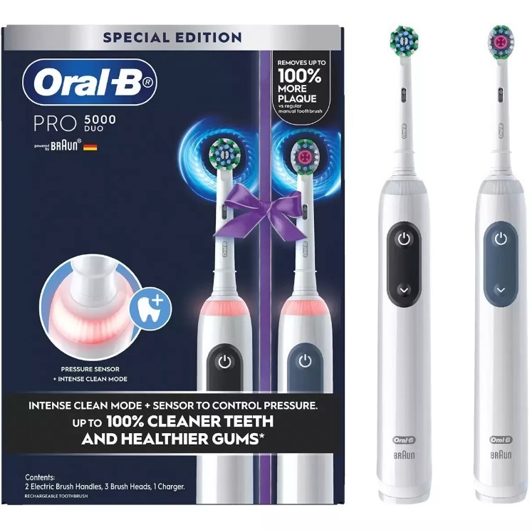 ORAL-B Braun Pro 5000 Electric Toothbrush Duo Pack Rechargeable. NB: Minor