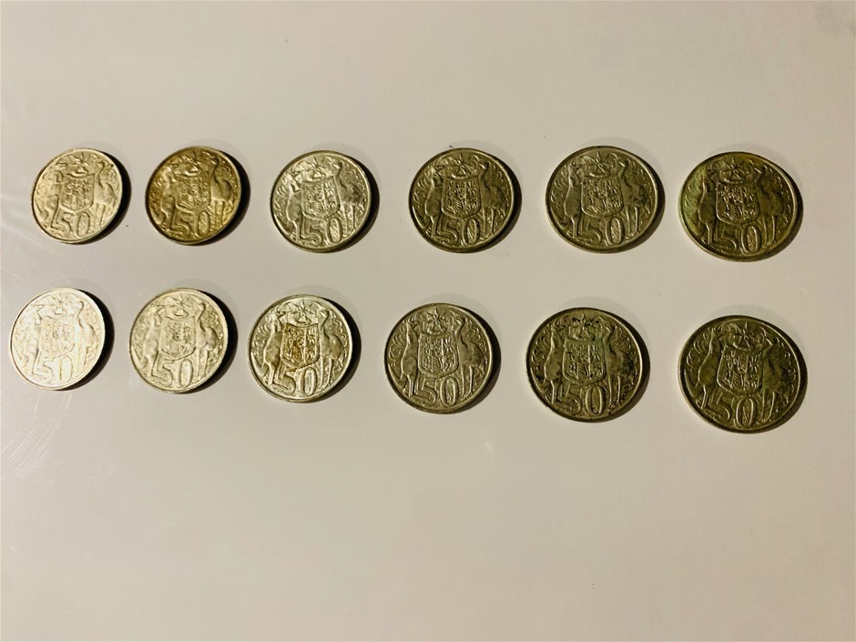 Lot of 12 1966 round 50 cent coins