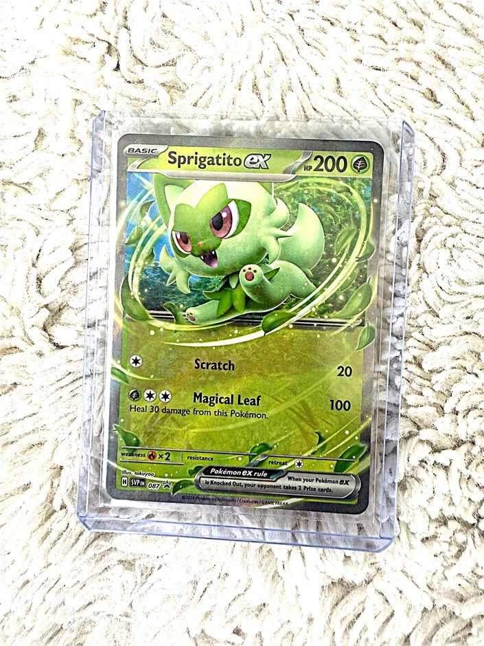 Sprigatito ex holo card Scarlet & Violet era grass starter.