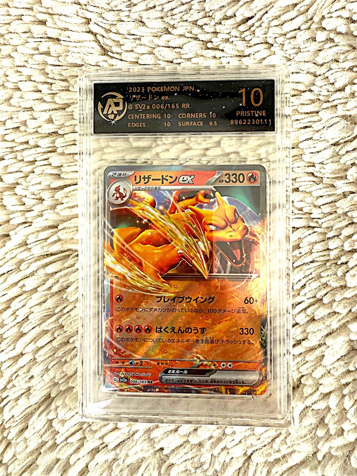 Charizard ex Japanese SV2a graded Pristine 10 slab.