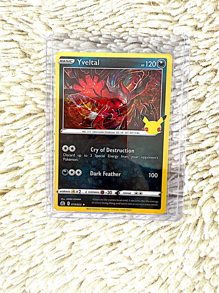 Yveltal 25th Anniversary holographic legendary card.