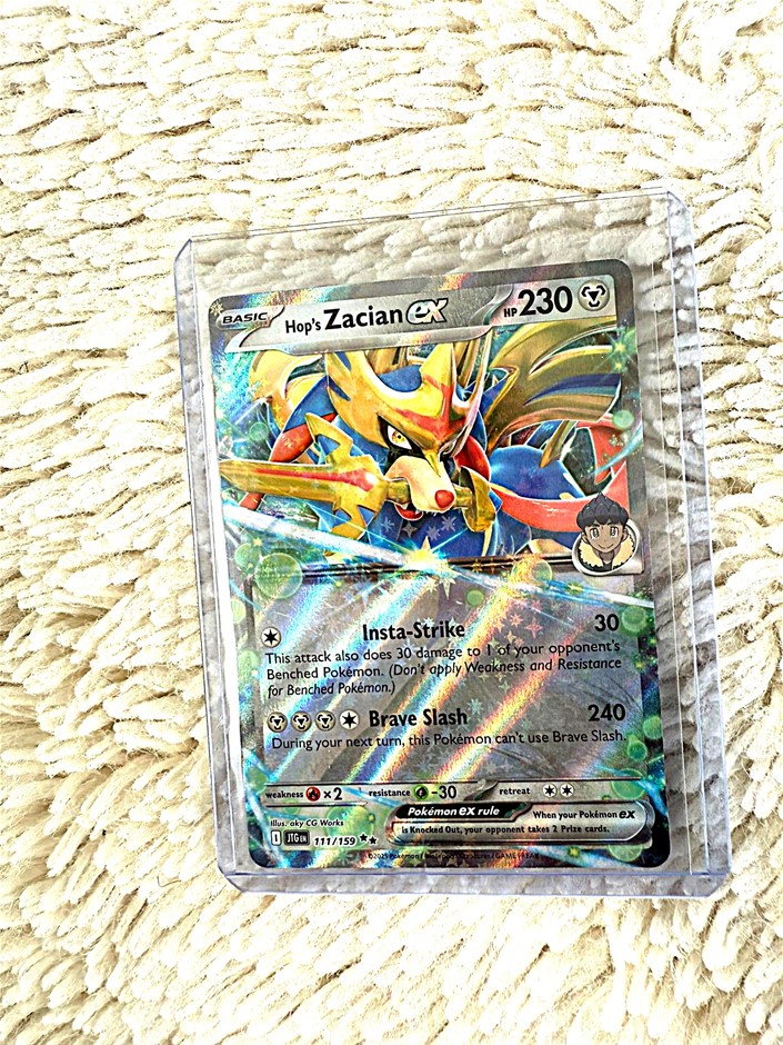 Hop’s Zacian ex full art trainer Pokémon card.