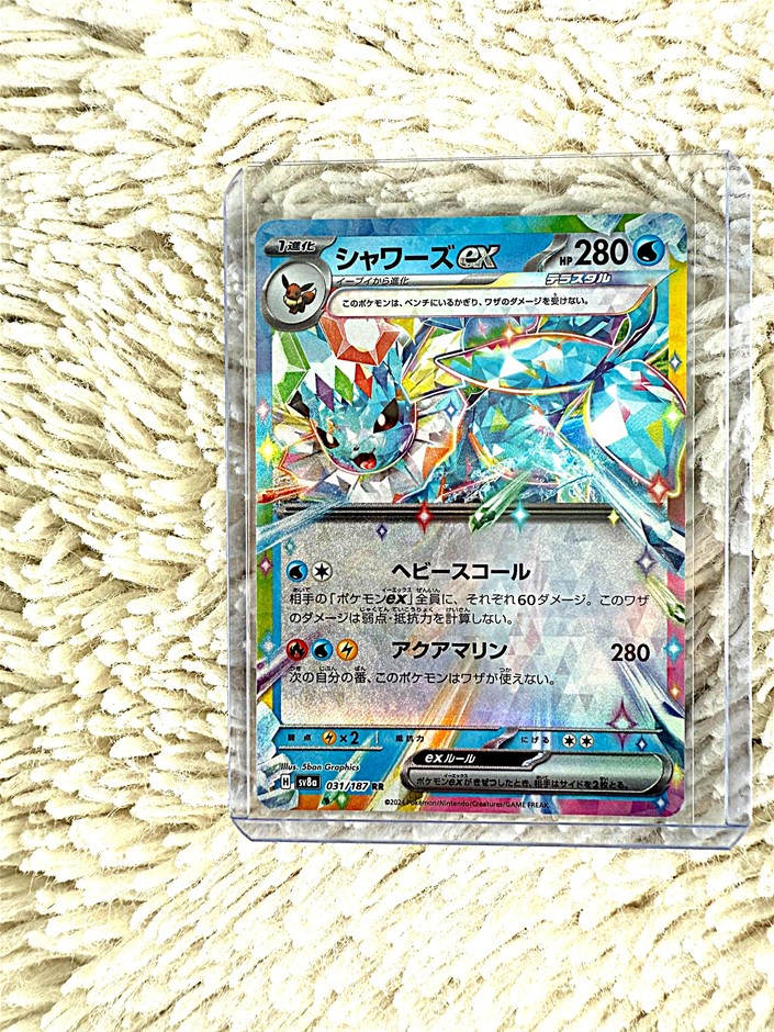 Vaporeon ex Japanese tera crystal holographic card.