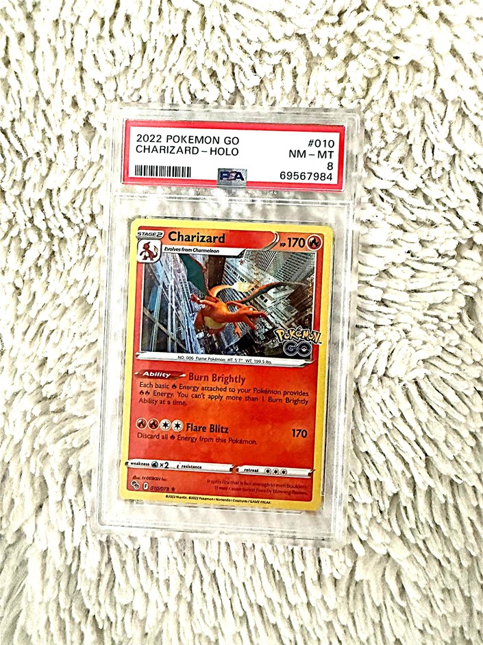 PSA 8 Charizard holo 2022 Pokémon GO #010 graded slab.
