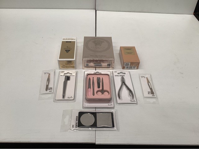 Assorted Purfumes And Manicure Tools