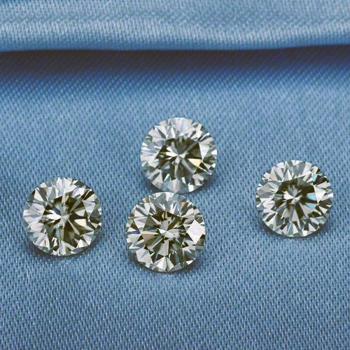 0.06 carat brown 4 round diamonds