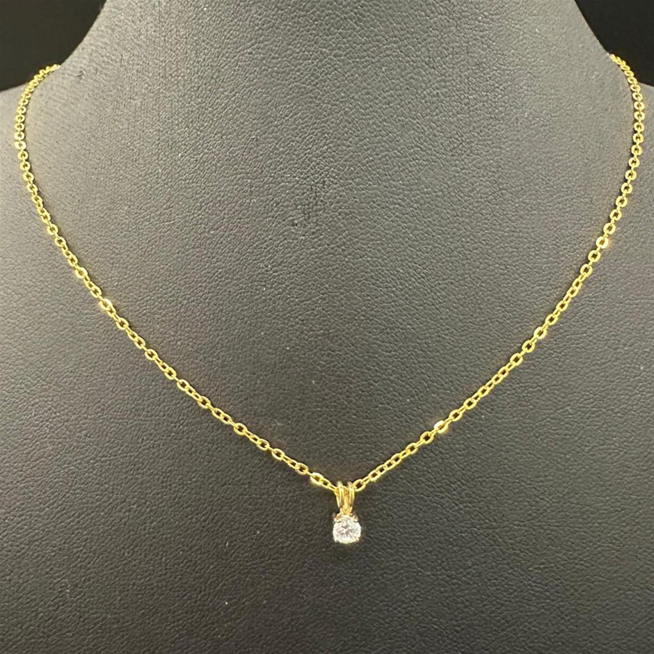 Stunning Simulated Diamond Round Pendant in Gold