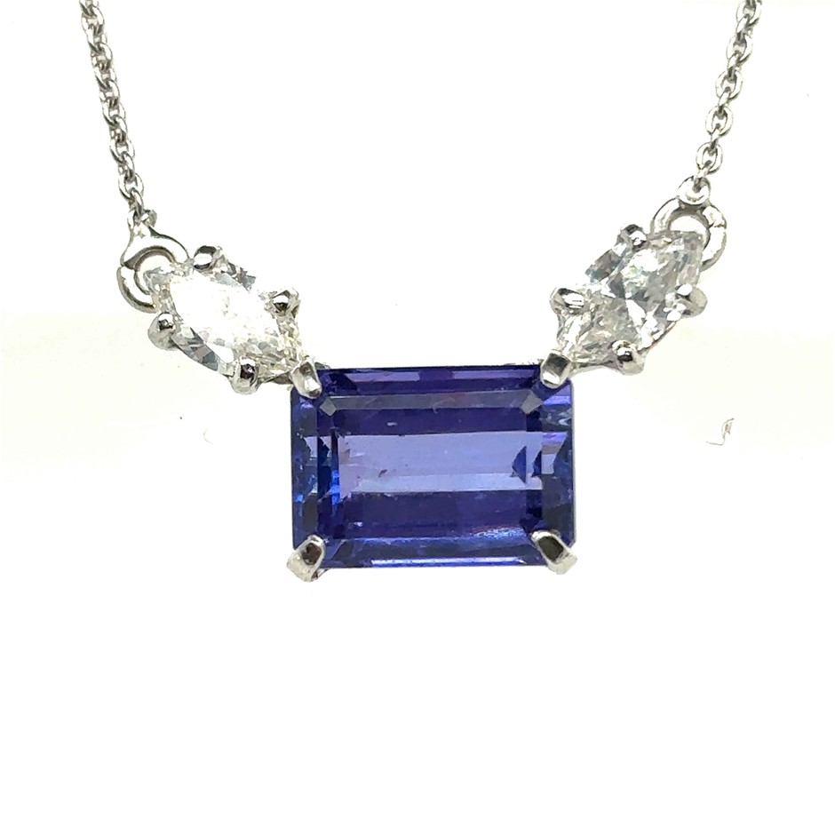 2.92ct an emerald cut Tanzanite & 0.58ct 2 Marquise cut VS/F Dia. Pendant