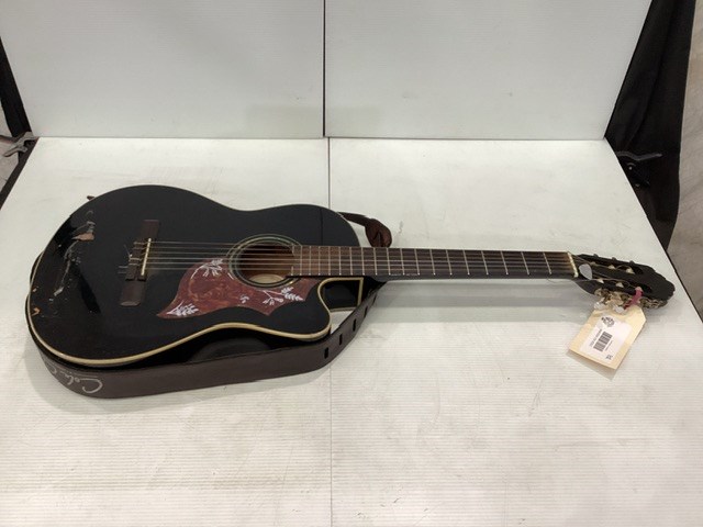 <p>Black Acoustic Guitar </p>