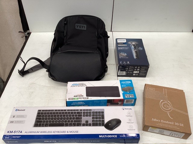 <p>Yeti Backpack Containing Assorted Items </p>