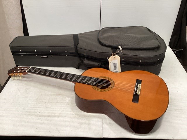 Yamaha Guitar Case Containing Yamaha Guitar