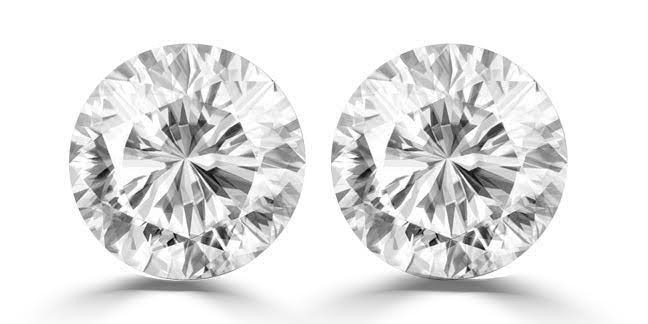 0.07 Carat round 2 white diamond