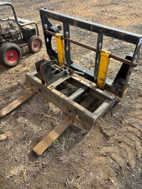 Skid Steer Loader Fork Attachment and Auger Drive Attachment