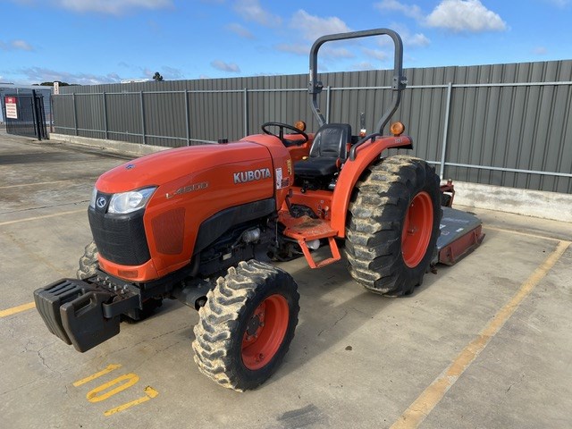 <p>Kubota L4600 Tractor with Slasher Attachment</p>